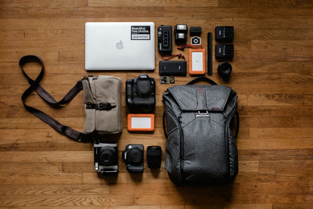 A flat lay shot of a travel bag and the products inside.