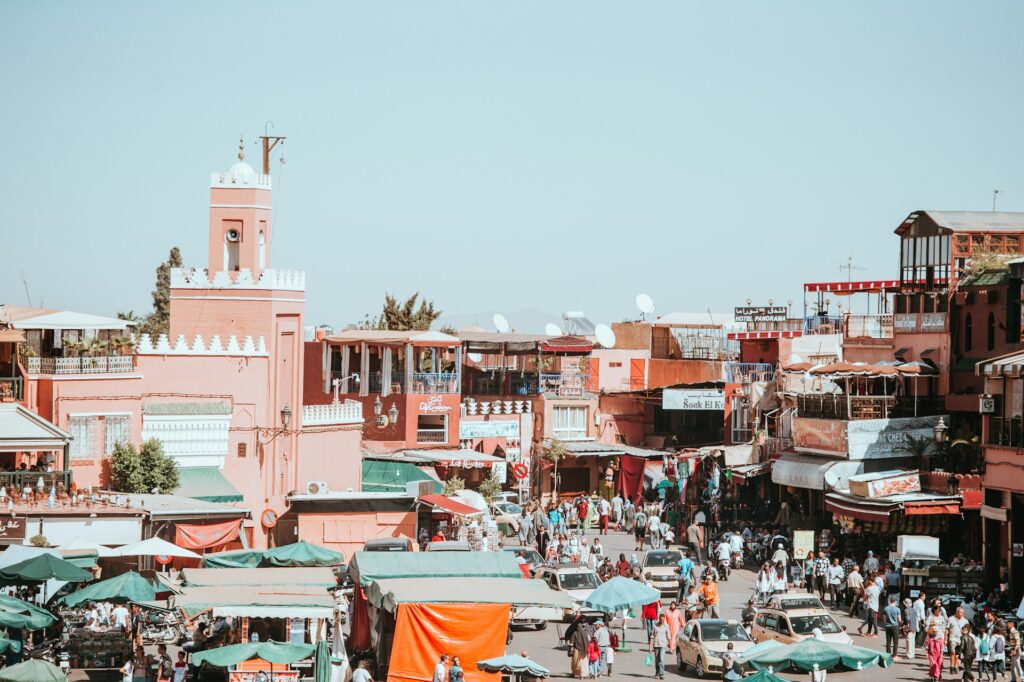 The markets of Marrakesh in Morocco - one of the best places to visit in October for warm weather.